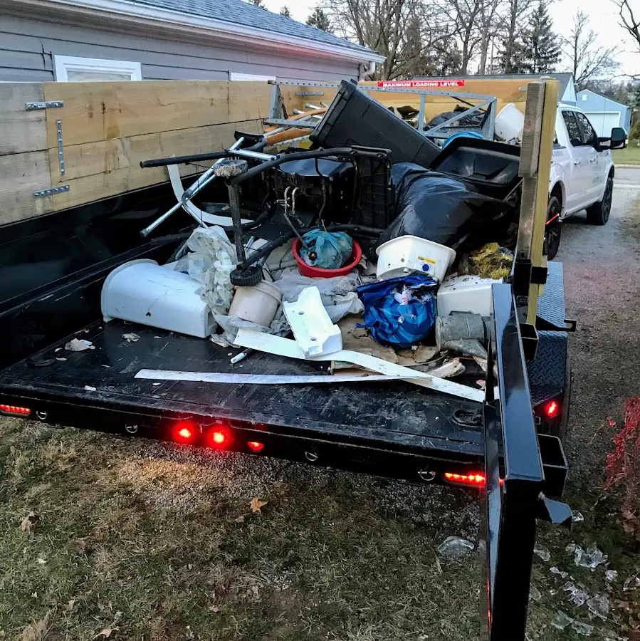 Roll-off dumpster delivered to a residential driveway in Napoleon