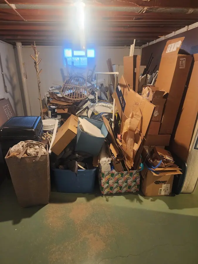 Roll-off dumpster container at job site for Roll Off Dumpster Rental in Napoleon